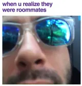 Extreme close-up of a bearded man in sunglasses captioned "when u realize they were roommates"