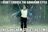 Man in blue blazer and sunglasses dancing amid flying debris, captioned "I didn't choose the Gangnam Style, the Gangnam Style chose me"