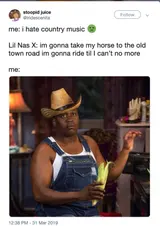 Screenshot of a tweet joking about hating country music, with a photo of a man in cowboy hat and overalls holding corn