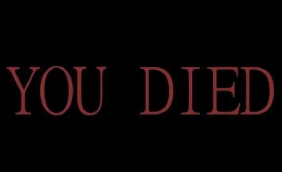 Dark red serif text "YOU DIED" centred on a plain black screen