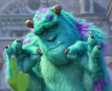 Teal furry horned monster with purple spots pinching his fingertips together, eyes half-closed in quiet satisfaction