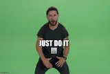 Bearded man in a black t-shirt shouting against a green screen, hands on his thighs, captioned "JUST DO IT !!!"