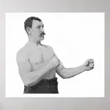 Vintage black-and-white photo of a shirtless mustachioed boxer with fists raised, printed as a white-bordered poster on gray