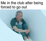 Elderly man in a green tracksuit hunched on the floor, captioned "Me in the club after being forced to go out"