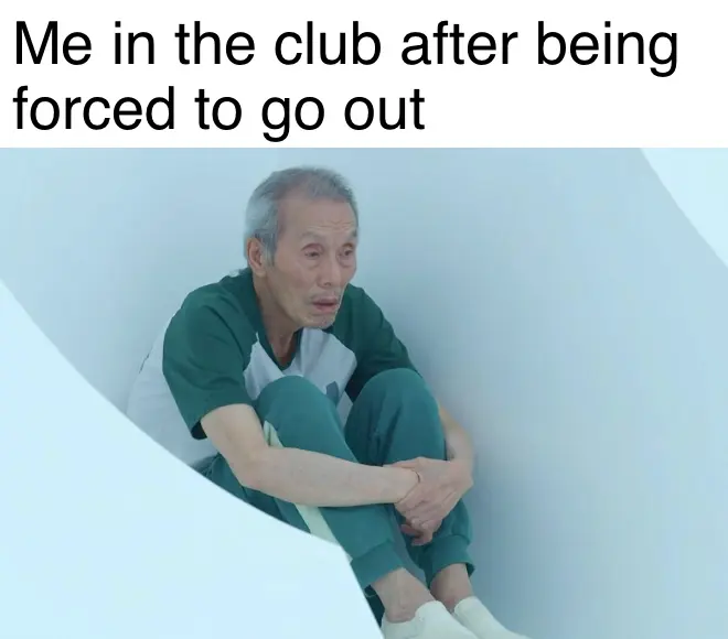 Elderly man in a green tracksuit hunched on the floor, captioned "Me in the club after being forced to go out"