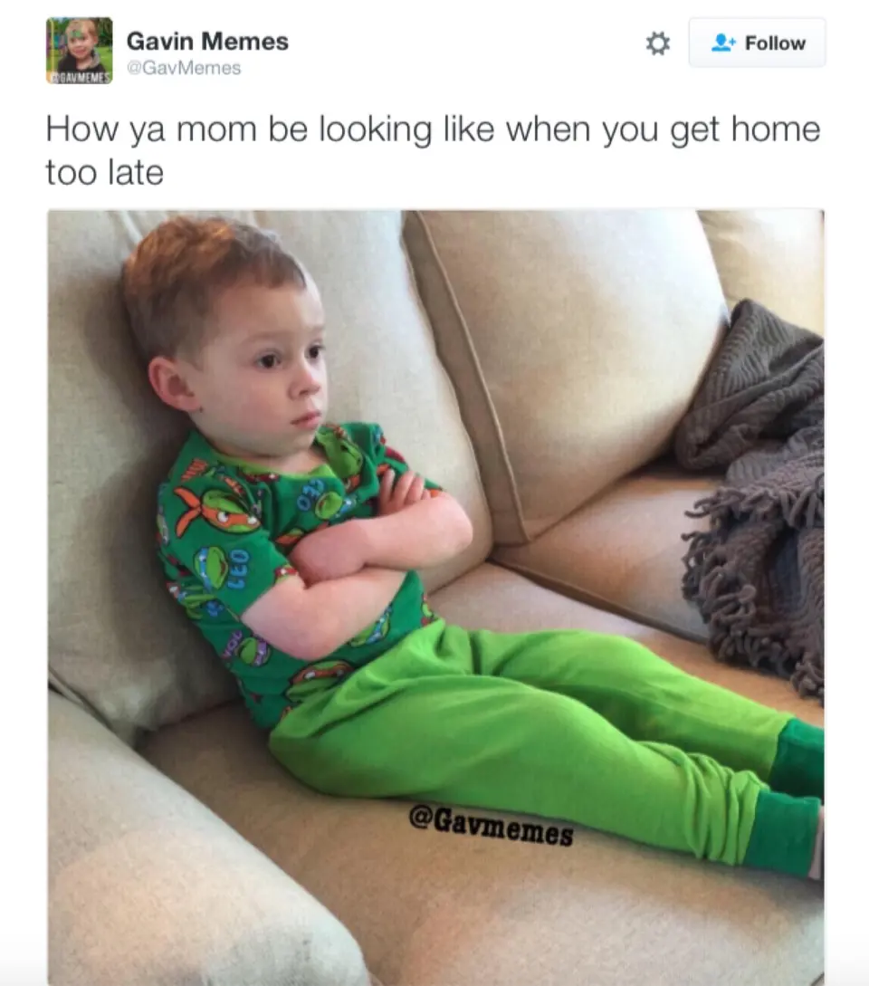Tweet captioned 'How ya mom be looking like when you get home too late' over a young boy scowling with crossed arms