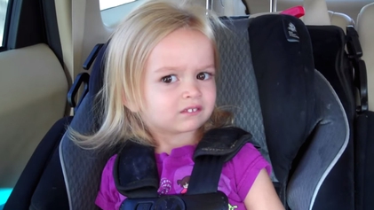 A skeptical sideways glance directed at the camera